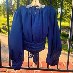 Long sleeve blue top with tie in the back